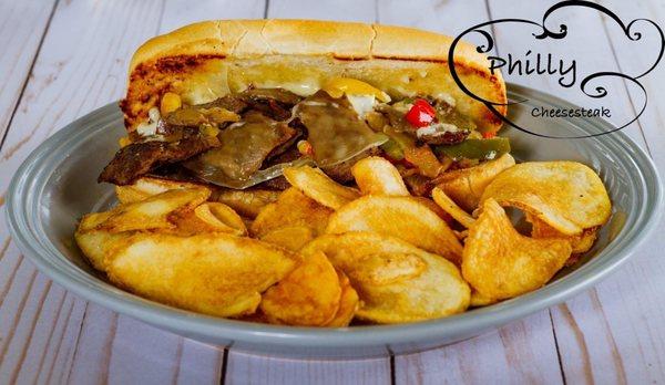 Philly cheesesteak and house made chips