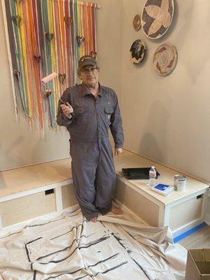 Me (Jeff) constructing the corner seating booth to match the existing cabinets in the kitchen.