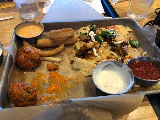 This is the sample platter and it very average the Nachos aren't very good.