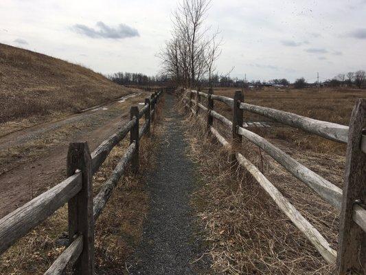 Walkway that leads to the river and across is the other town Carteret.