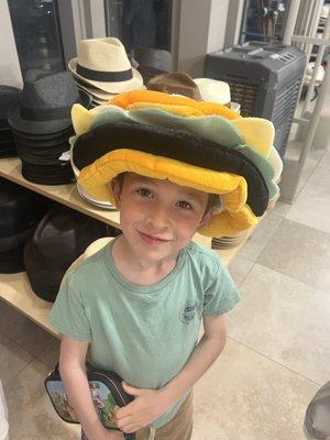 My grandson modeling a fun hamburger hat from Hats  unlimited