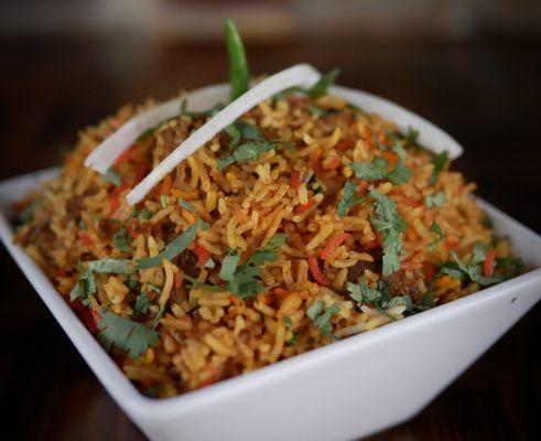 Chicken Biryani.... slow cooked rice with fresh touch of flavorful spices and chicken.