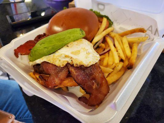 Farmhouse burger with fries.