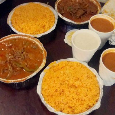 Slamming all i can say.pepper steak with red sause yellow rice with beans .and oatmeal  on the side