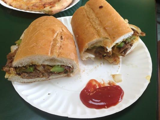 half cheese steak, peppers, and onions