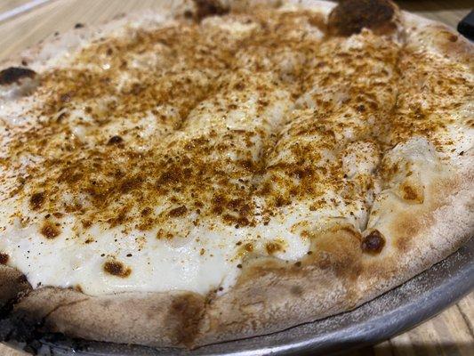 Crab Pizza:  10" Pizza with Lump Crab Meat, In-house Made Garlic White Sauce and Old Bay Seasoning.