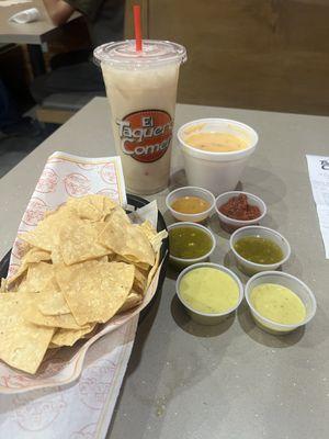 Salsa selection. Chips and queso. horchata