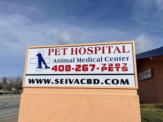 Street sign, it's a little hard to see but it's literally next door to the Pet Hospital