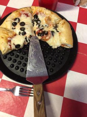 Cheese pizza with black olives