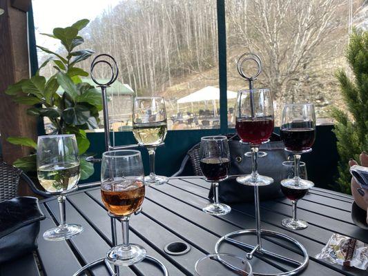 Inside covered patio and wine flights.