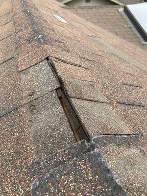 Aged roof surface with exposed wood