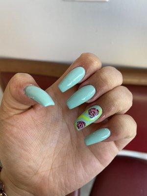 Light blue acrylic nails with floral accent nail