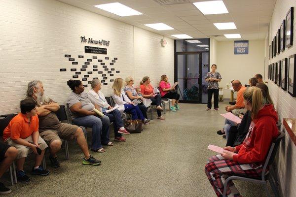 Robinson's Rescue RVT giving post-op instructions to pet-owners before taking their pets home