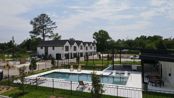 Highland Commons 108 New Homes built by Cityside Homes. Gated community features pool, dog park, lounge area.