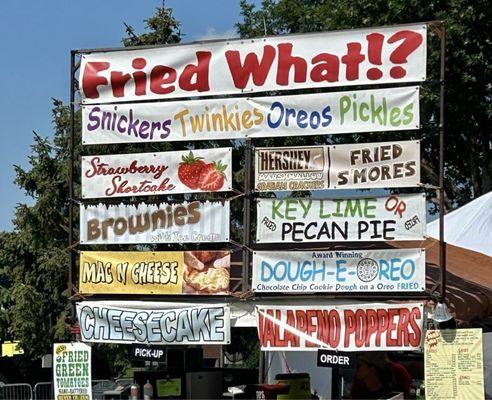 Food options abound. Small and expensive plates at the Cultural Village, with better options in the fair's center & back areas.