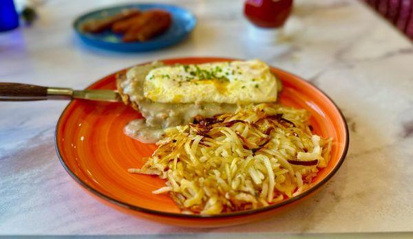 Chicken Fried steak with hash browns & scrambled eggs