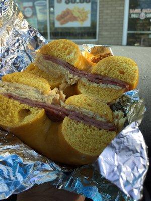 Pork roll and egg on an egg bagel with salt and pepper.