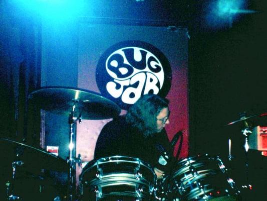 Brian Shafer of Nod playing drums on stage @ the Jar