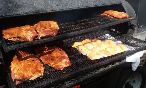 Beef brisket and salmon going for a ride in the smoker.