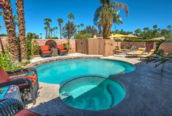 Villa Aurora -- Sun worshipers stretch out on your private pool deck or duck out of sun in therapy spa under shaded patios:  just relax.