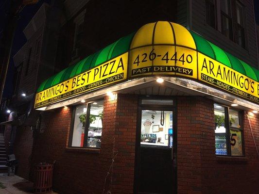 Enjoying some pizza in the ghetto of North Philly. It's loud rambunctious, and quite dangerous here. Really good pizza though (crispy).