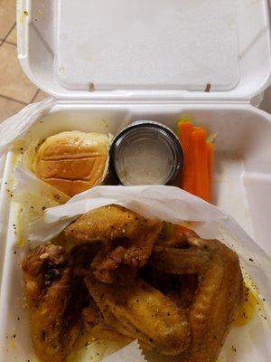 Lemon pepper wings and carrots with a roll and ranch dressing