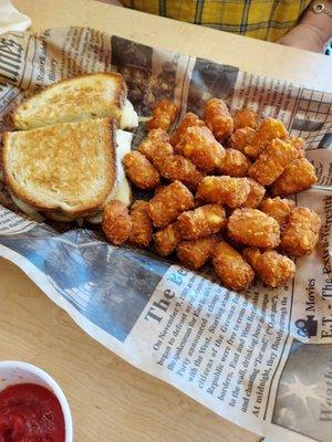 Great Patty Melt loaded with tater tots!