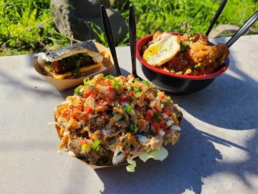 Surf and turf spam musubi, garlic chicken with egg, pulled pork tots