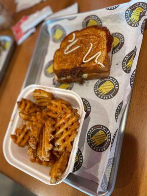 Halal Philly Grilled Cheesesteak, Parmesan Waffle Fries, Fried Mac and Cheese Balls, Avocado BLT & E