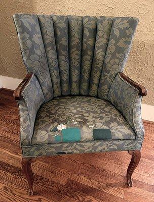 Before: chair, worn and patched