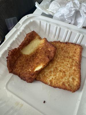 The two extra slices of cheese I ordered. The mangy order came with one little piece