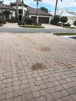 Stained driveway with Gomez Roof "solution"