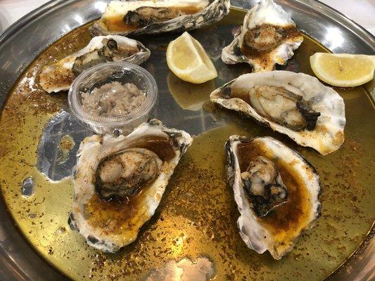 Oysters steamed in seasoned garlic butter