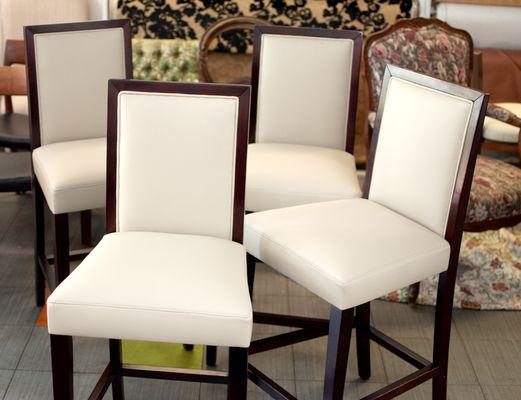 Dining room chair set upholstered in a lovely cream vinyl.