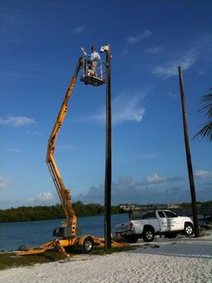 Mounting a live streaming Web cam on Sombrero Beach in Marathon.