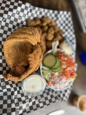 Catfish platter is always fresh with a side of fried okra and side salad.