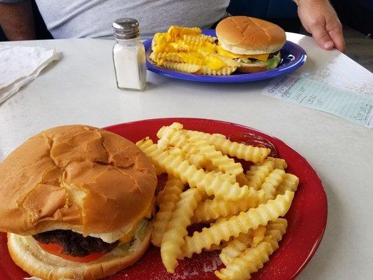 Burger with cheese, fries and cheese fries with two drinks $17.92