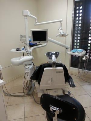 Dental chair in exam room