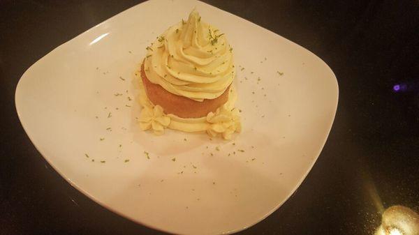 Rumchata Tres Leches topped with Bavarian Vanilla cream and lime zest.