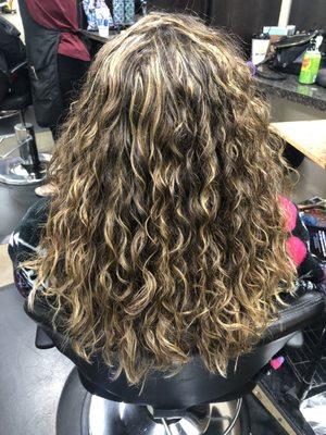 Highlights and cut on curly hair