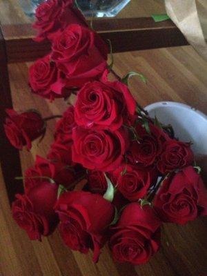 Red roses being prepped