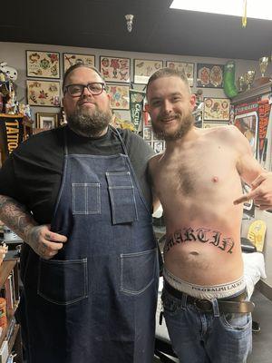 Tyler the worlds best tattoo artist and me Cadillac Jack the worlds best barber.