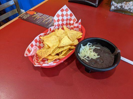 Never been to a place that serves beans with the chips- really nice touch!