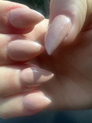 Thick awful nails can see where they aren't even coated properly .