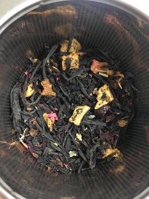 There's no pomegranate in this tea mixture. It tastes and smells like apples, mango and rose hips.