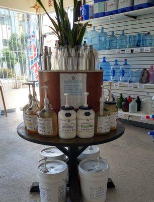 PB Soap Refill Station now open inside the PB Water Store. Bring in your own bottle to fill per ounce,or pick from our collection of bottles