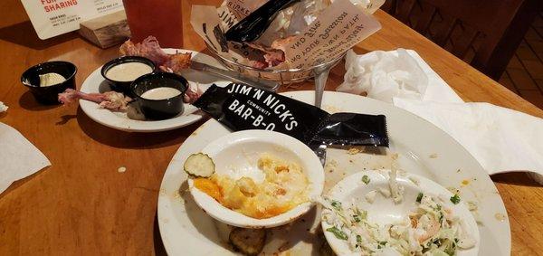 Remnants of the chicken, coleslaw, mac-n- cheese.  The white sauce was good and different.