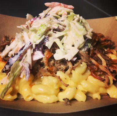 Meats n Mac - Our creamy mac n cheese topped with pulled pork, BBQ sauce and coleslaw.