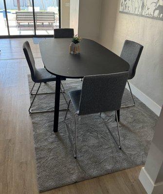 Ikea rectangular type of table. Hard to get around from the back wall seat