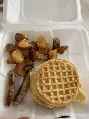 breakfast sandwich with waffle, turkey sausage and skillet potatoes ... YUM